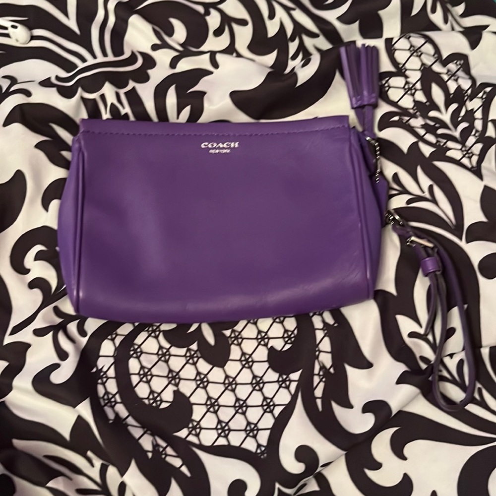 Purple coach wristlet. Used like new